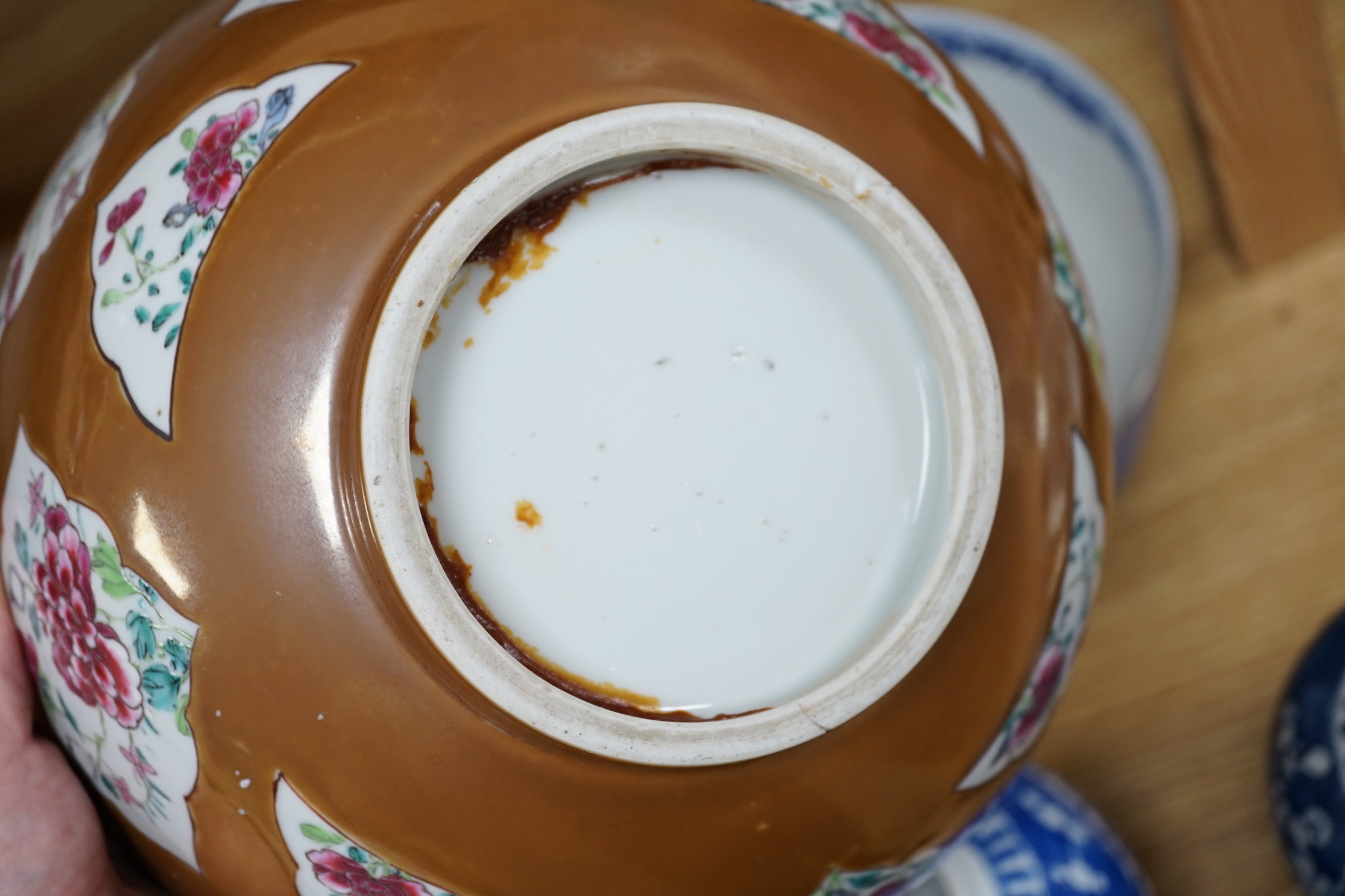 A group of Japanese and Chinese ceramics to include two blue and white jars, a wucai bowl etc.